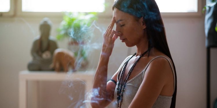 Woman practicing pranayama
